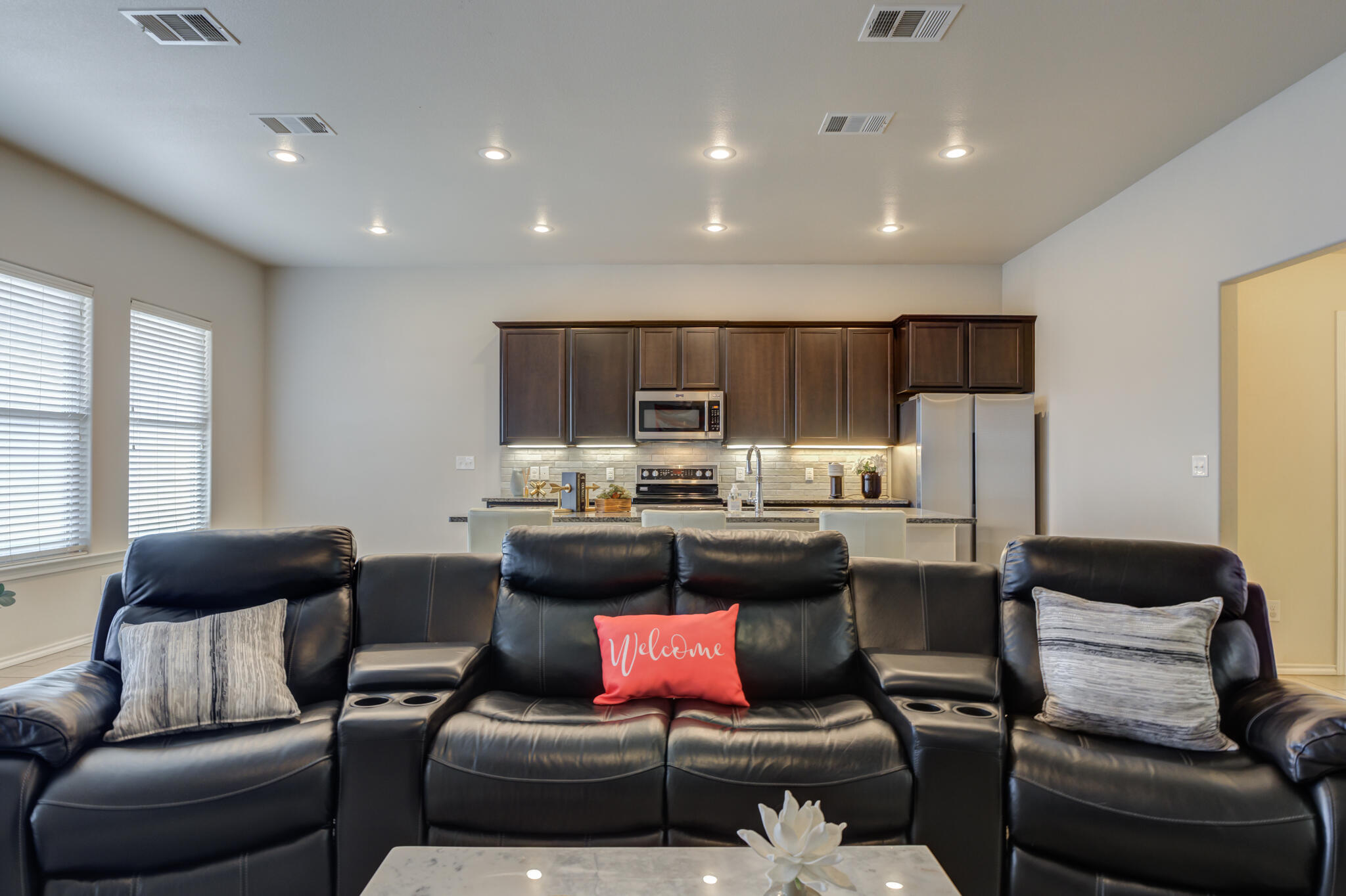 7201 94th Street Lubbock, TX 79424 - Photo 6 of 34 a living room with furniture and a couch