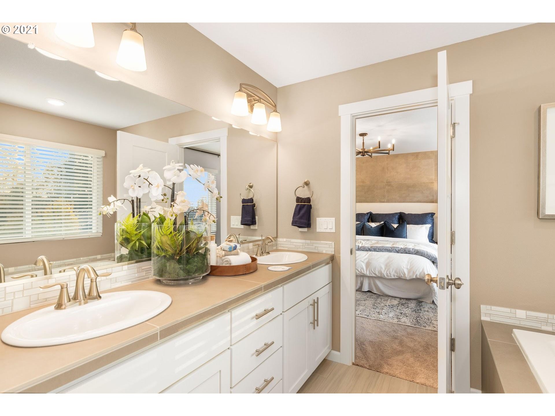 3724 South 42nd Place Ridgefield, WA 98642 - Photo 22 of 31 a bathroom with a granite countertop sink mirror and a