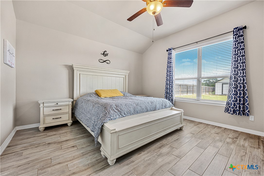 2021 Rustic Manor Drive Temple, TX 76502 - Photo 14 of 30 a bedroom with a bed and window