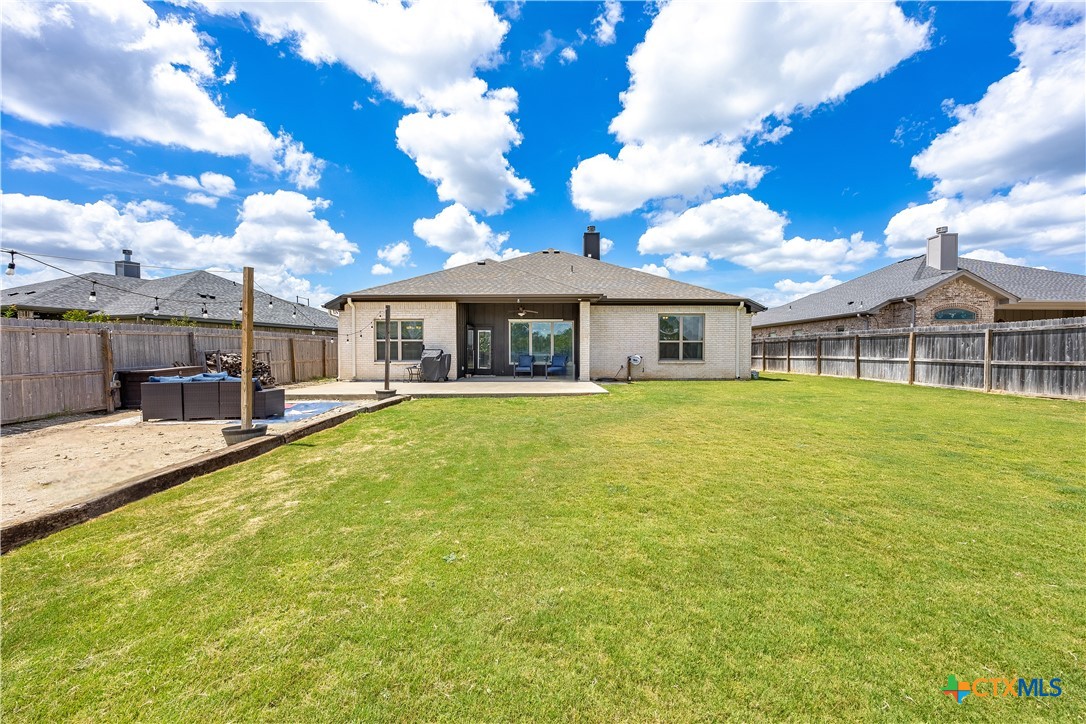 2021 Rustic Manor Drive Temple, TX 76502 - Photo 25 of 30 a view of a house with a swimming pool