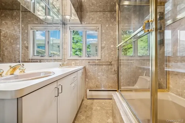 a bathroom with a sink and a bathtub