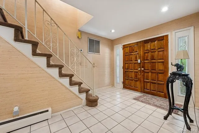 a view of entryway with stairs