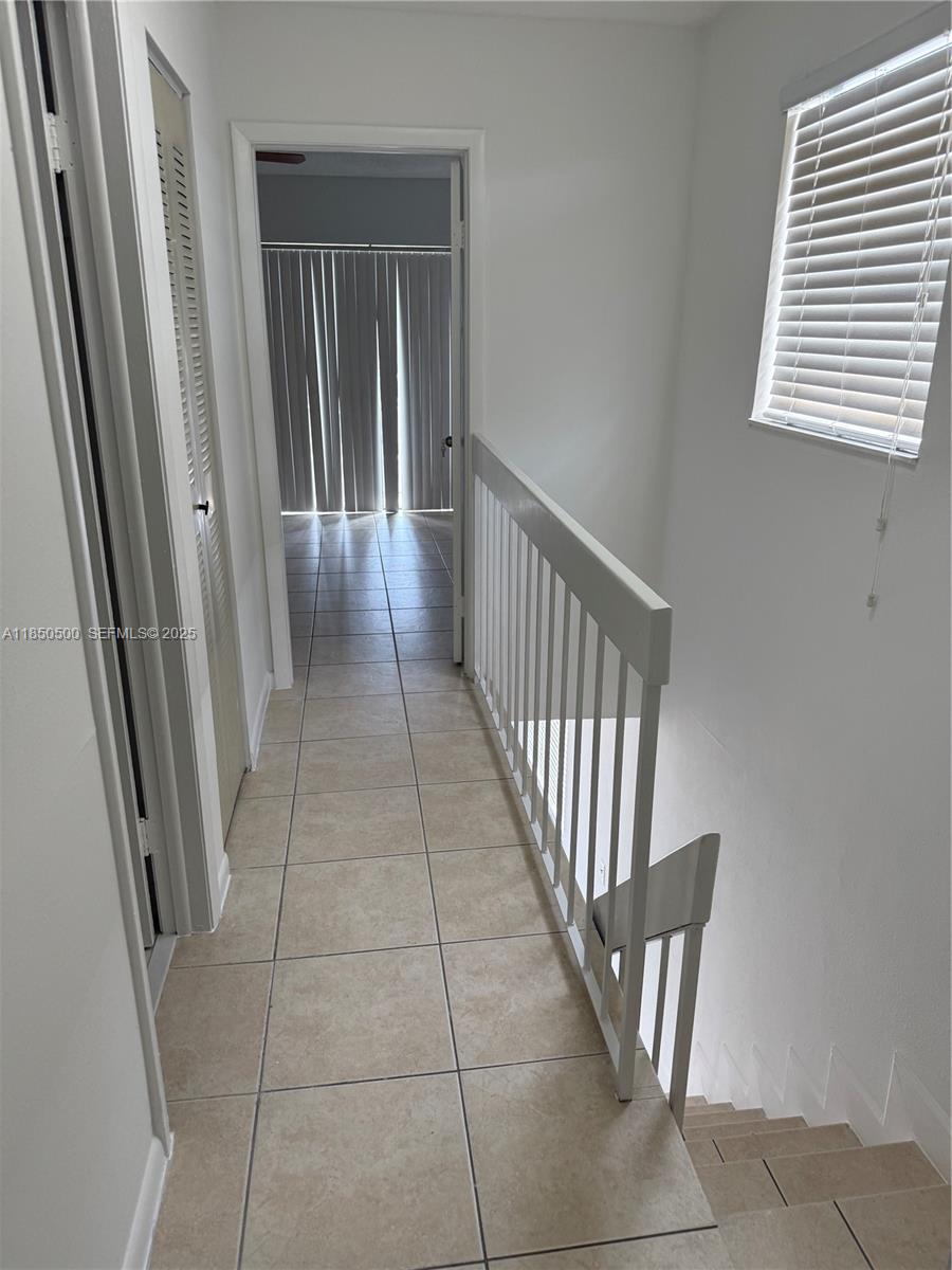 2289 West 52nd Street, Unit 23 Hialeah, FL 33016 - Photo 13 of 23 a view of a hallway