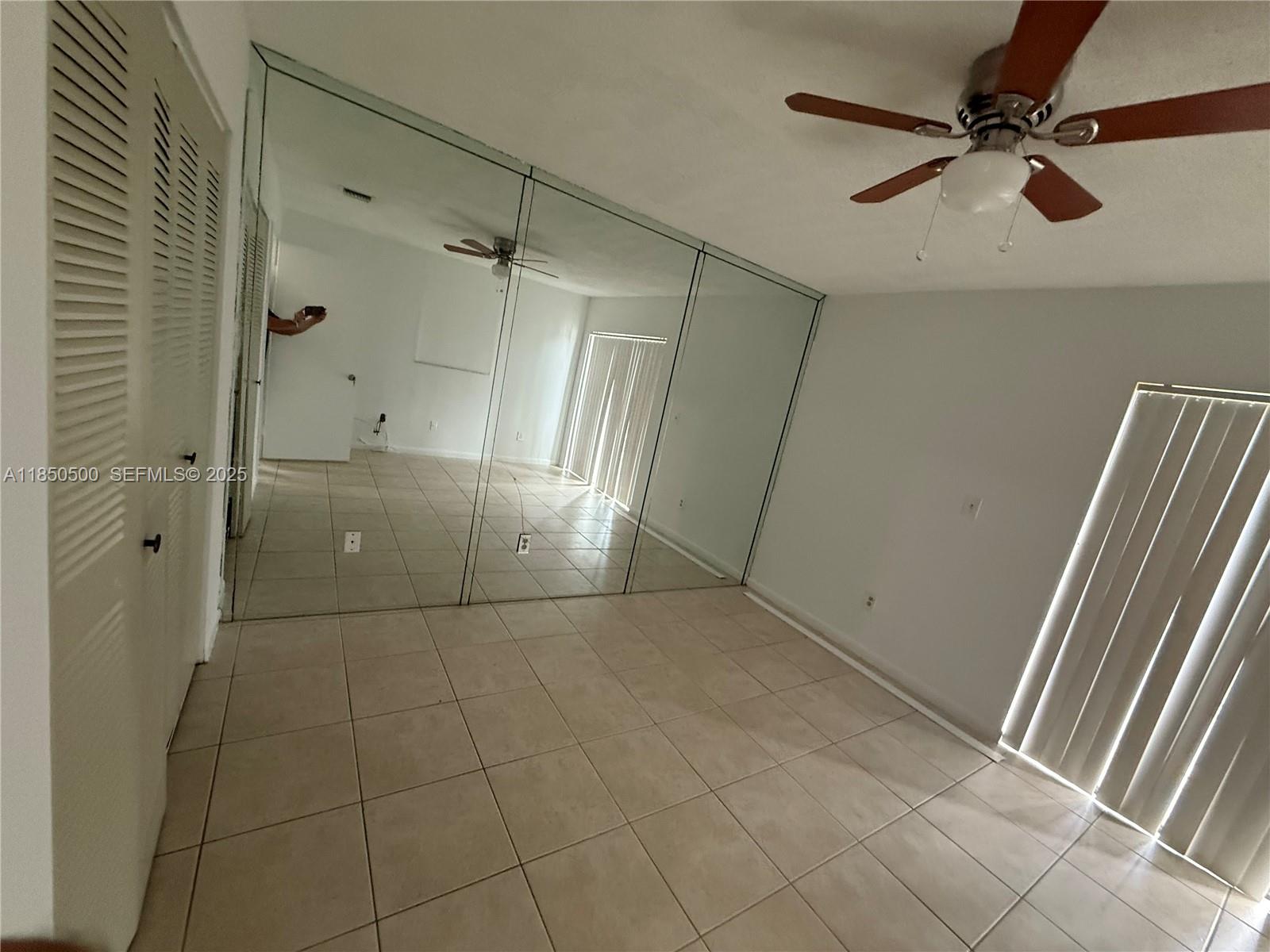 2289 West 52nd Street, Unit 23 Hialeah, FL 33016 - Photo 15 of 23 a view of an empty room