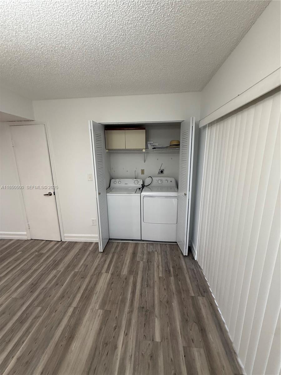 2289 West 52nd Street, Unit 23 Hialeah, FL 33016 - Photo 21 of 23 a view of a room with a sink and dishwasher cabinets