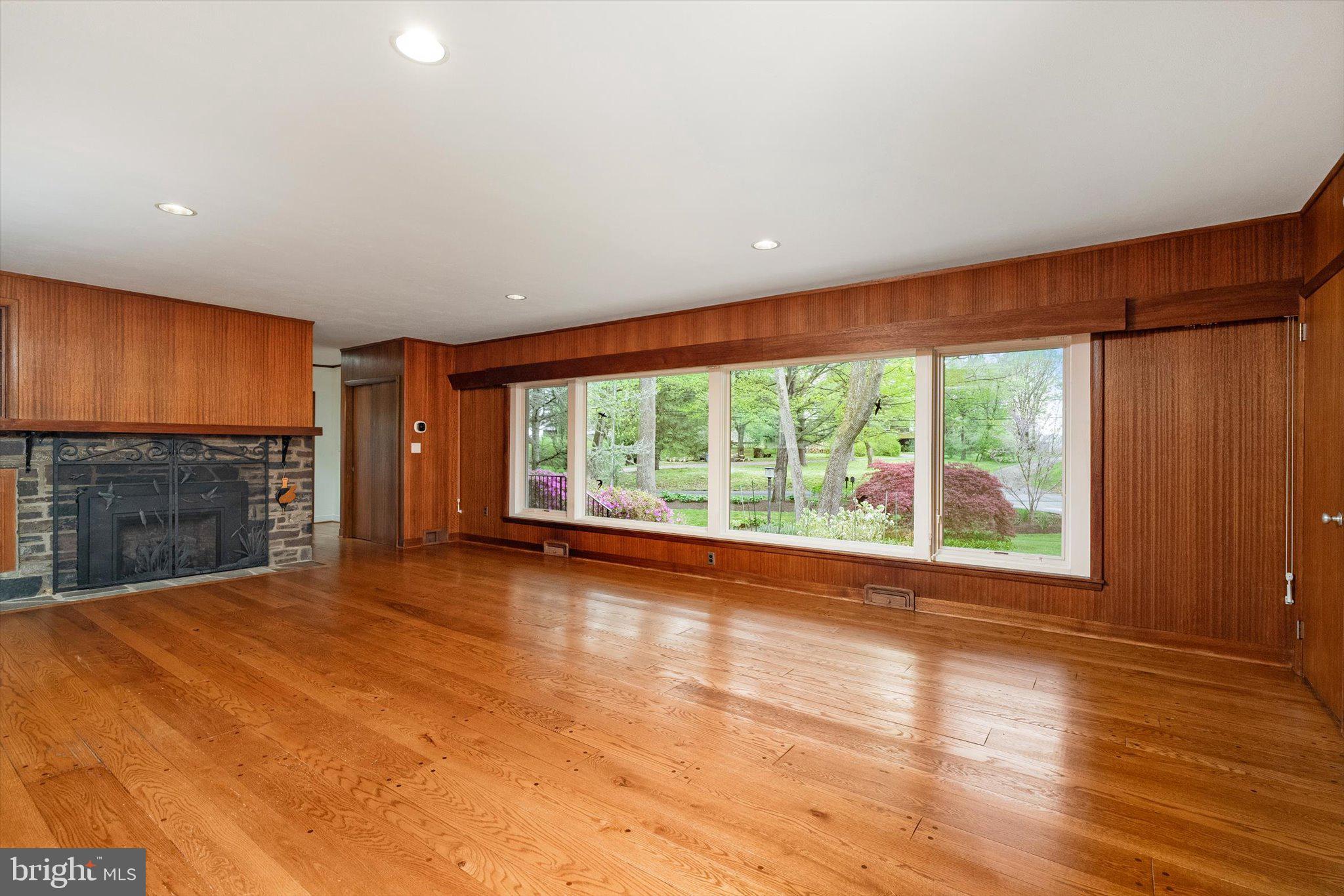 6783 Chapel Road New Hope, PA 18938 - Photo 7 of 42 Foyer opens to large living room.