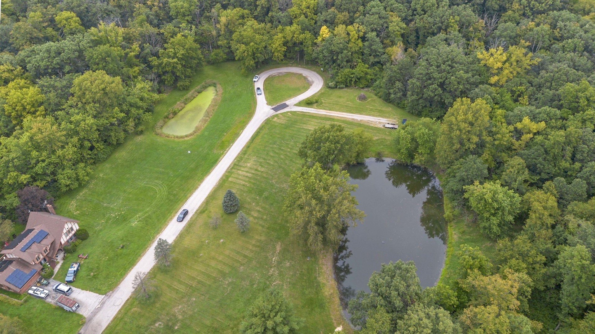 2220 Anne Lane Crete, IL 60417 - Photo 4 of 16 a view of a lake from a yard