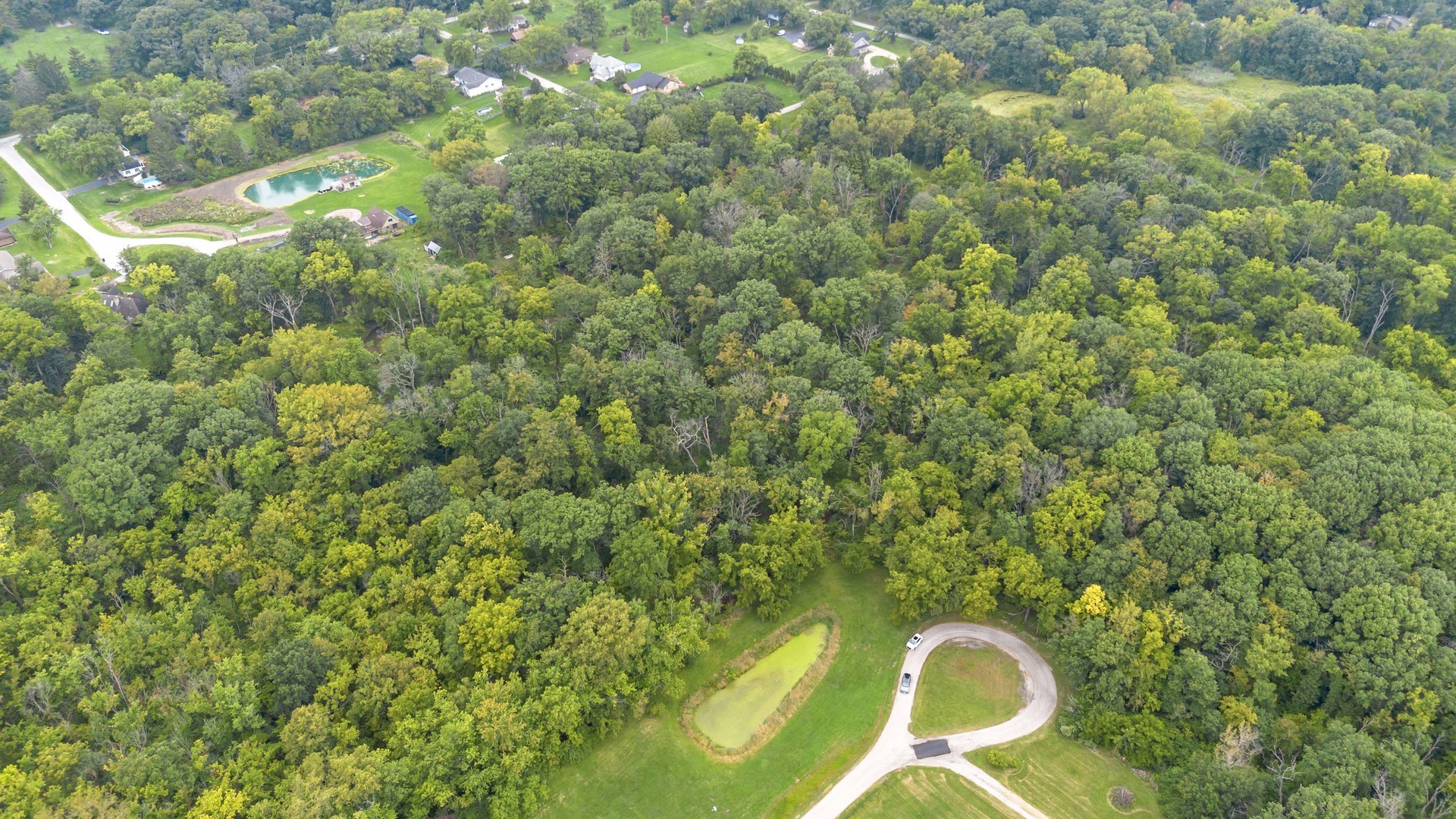 2220 Anne Lane Crete, IL 60417 - Photo 5 of 16 a aerial view of a house with swimming pool and garden