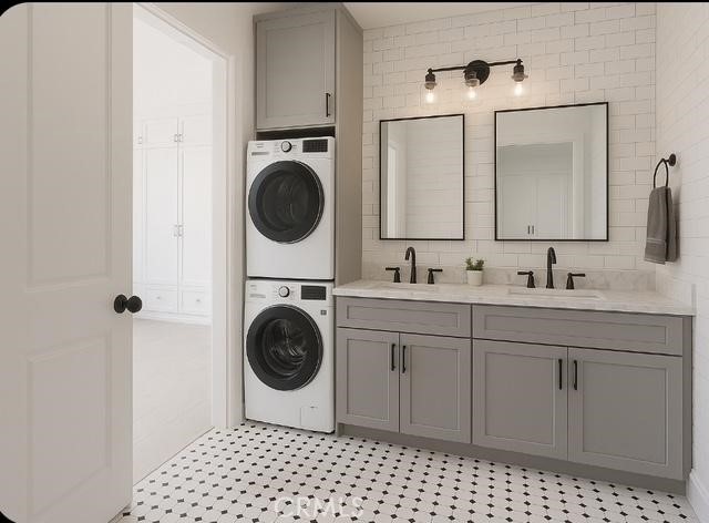 3870 El Hijo Street Riverside, CA 92504 - Photo 3 of 4 a bathroom with a sink a washer and dryer