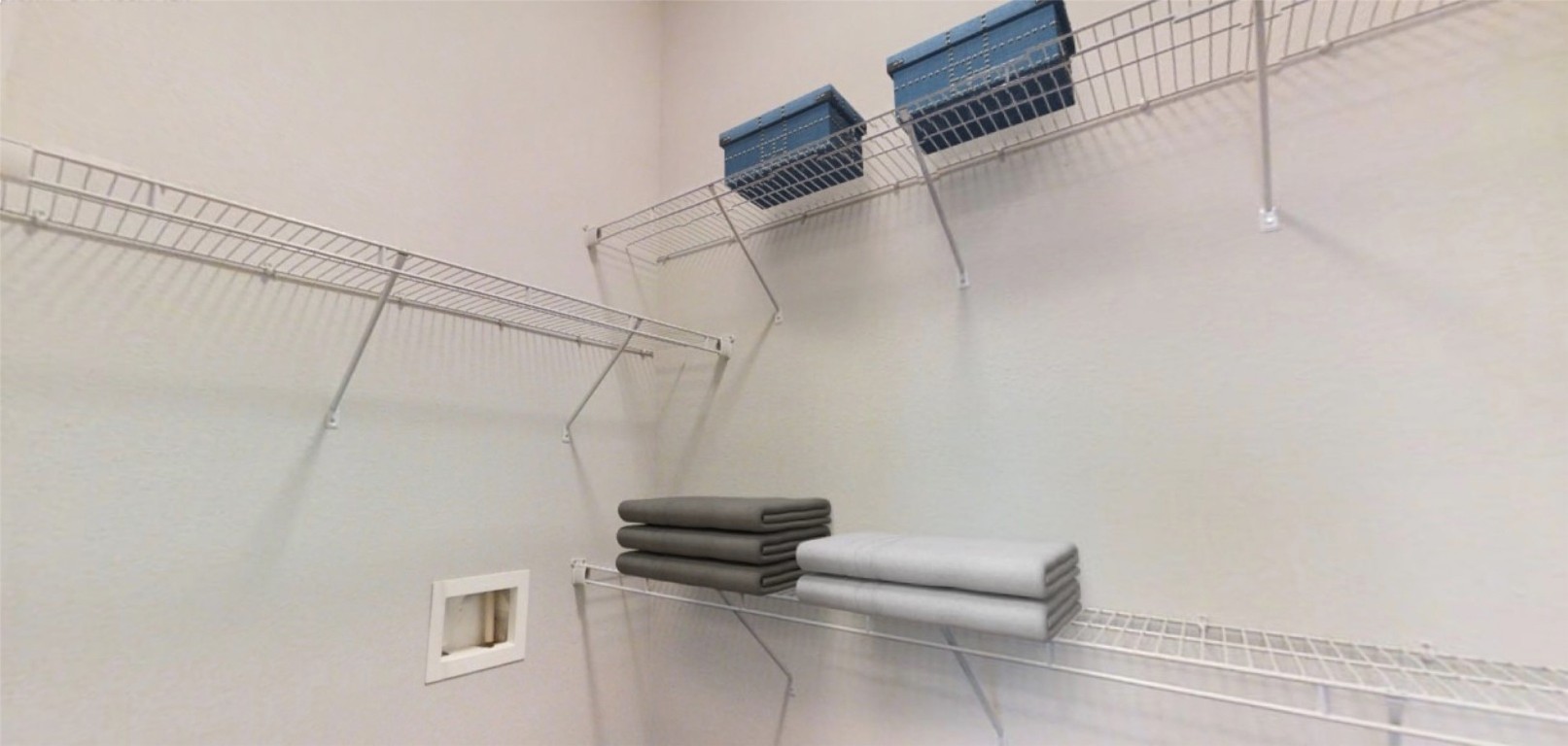 2525 McCue Road, Unit 112 Houston, TX 77056 - Photo 12 of 32 a view of a room with racks on the wall