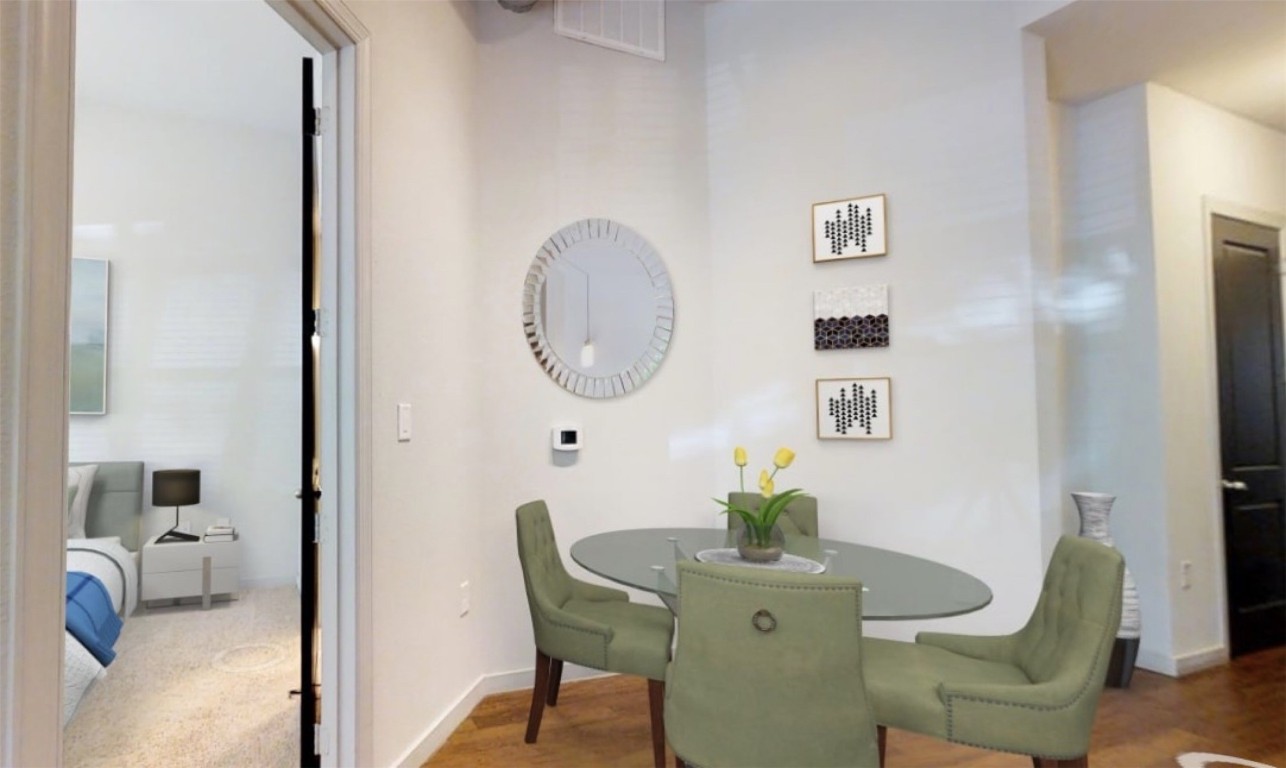 2525 McCue Road, Unit 112 Houston, TX 77056 - Photo 15 of 32 a living room with furniture and a mirror