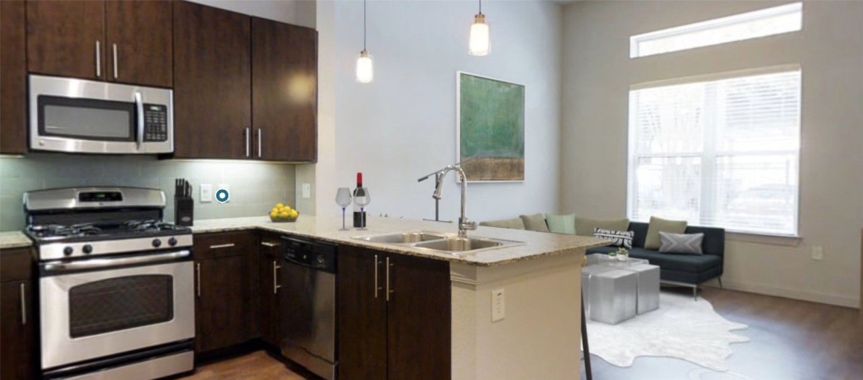2525 McCue Road, Unit 112 Houston, TX 77056 - Photo 18 of 32 a kitchen with a sink stove and microwave