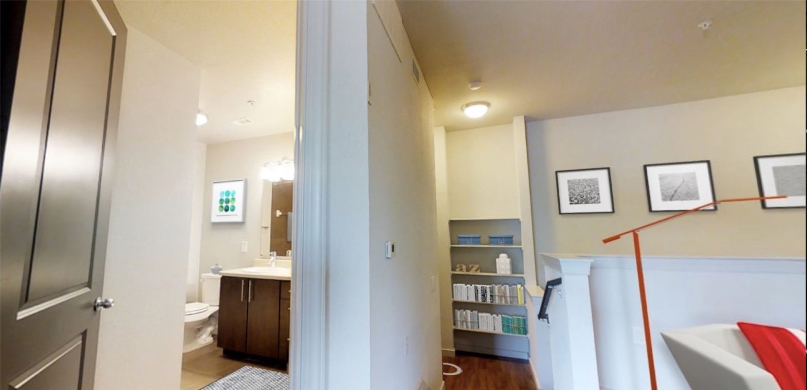 2525 McCue Road, Unit 112 Houston, TX 77056 - Photo 22 of 32 a view of kitchen and hallway with wooden floor