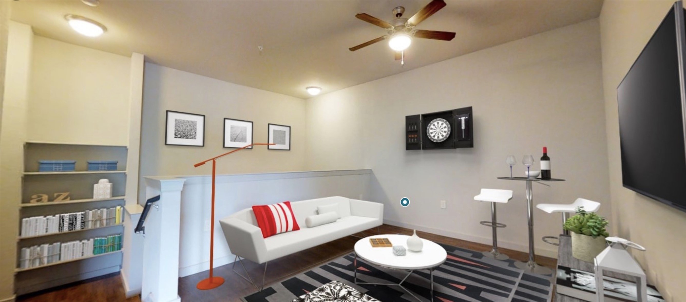 2525 McCue Road, Unit 153 Houston, TX 77056 - Photo 23 of 32 a living room with furniture and a bookshelf