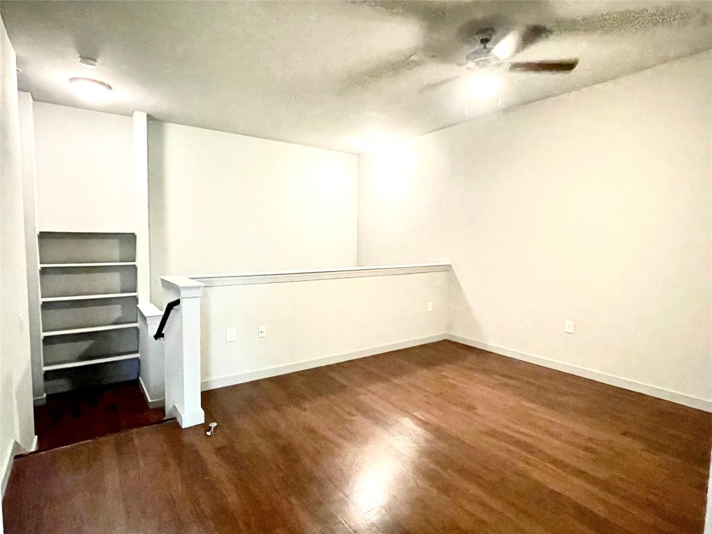 2525 McCue Road, Unit 112 Houston, TX 77056 - Photo 10 of 32 a view of an empty room with a window