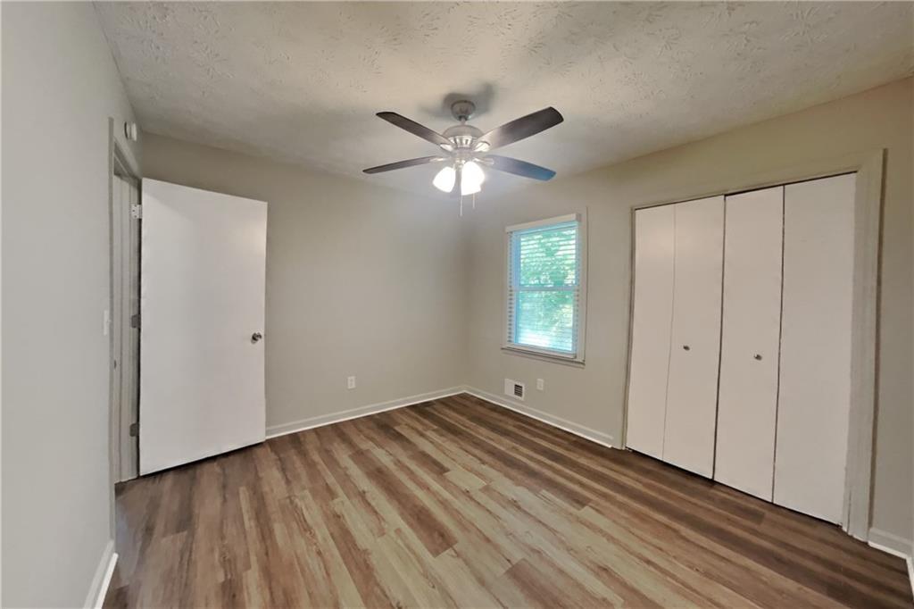 3117 Calumet Circle Northwest Kennesaw, GA 30152 - Photo 14 of 21 a view of an empty room with a window