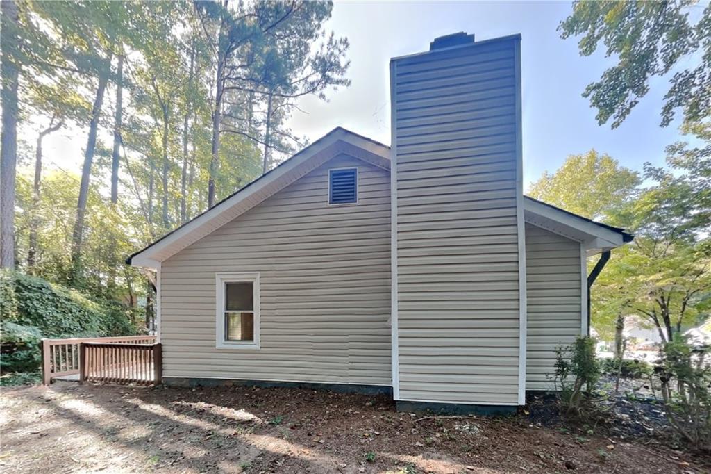3117 Calumet Circle Northwest Kennesaw, GA 30152 - Photo 18 of 21 a view of a house with a yard