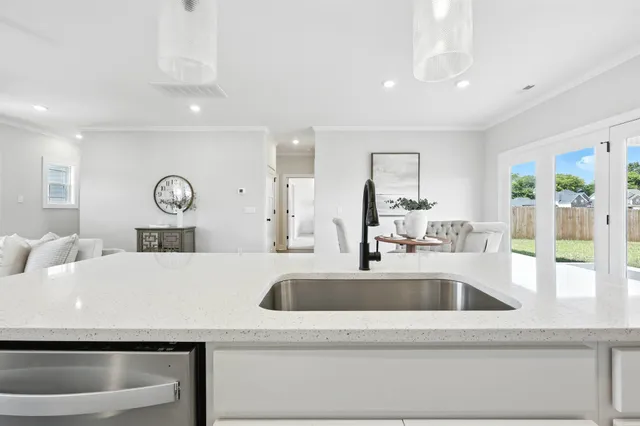 a close view of sink and mirror in room