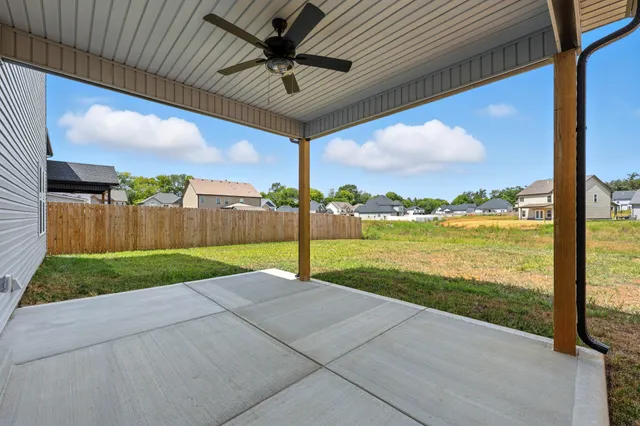 a view of a backyard of the house