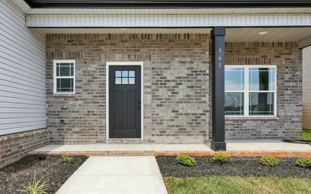 a brick building with a outdoor space