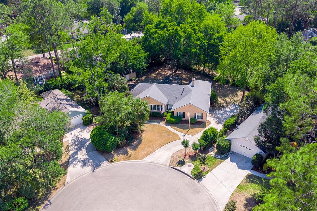 6924 Southwest 80th Drive Gainesville, FL 32608 - Photo 59 of 65 an aerial view of a house with garden space and street view