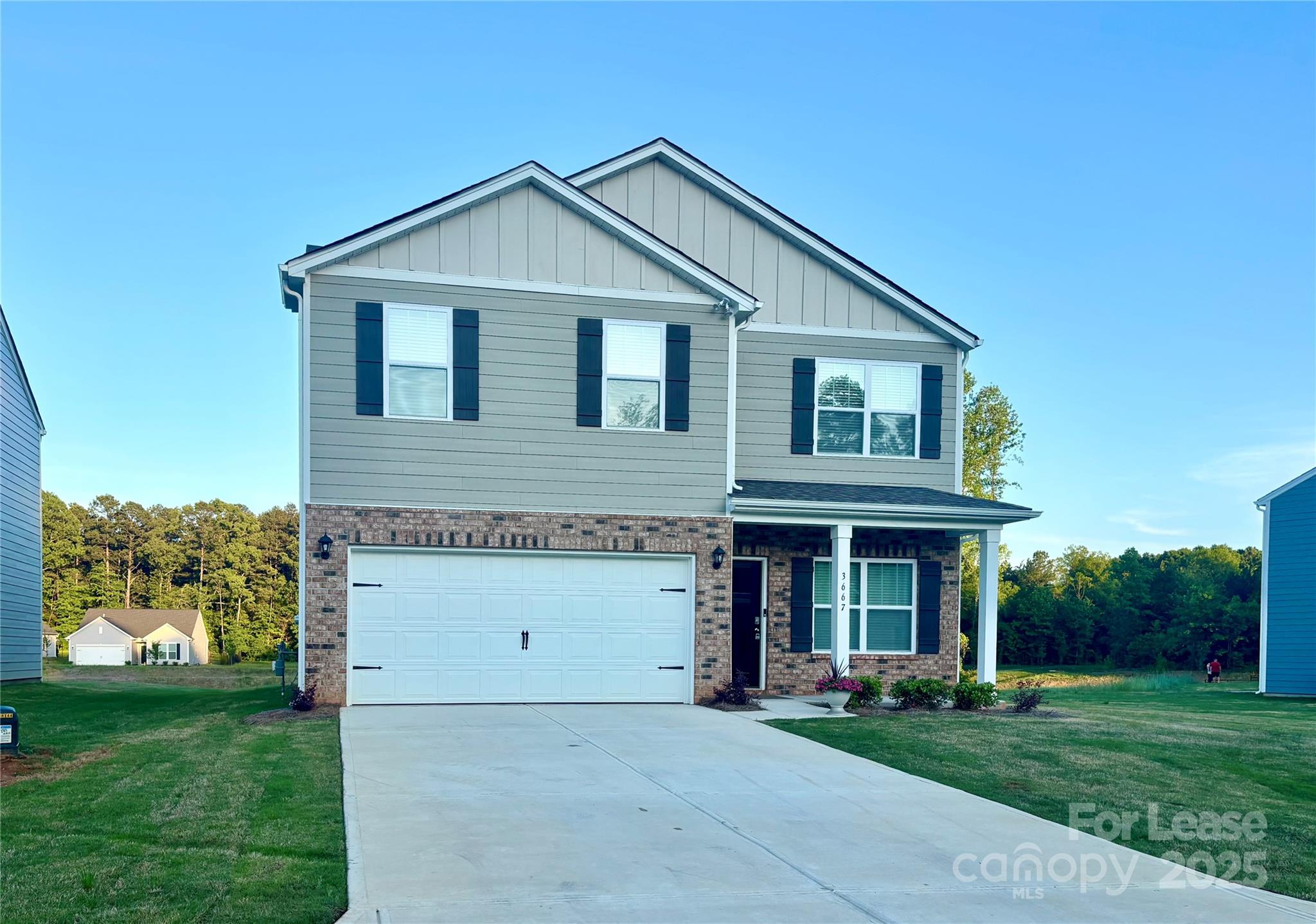 3667 Mercer Street Terrell, NC 28682 - Photo 2 of 38 a front view of a house with a yard