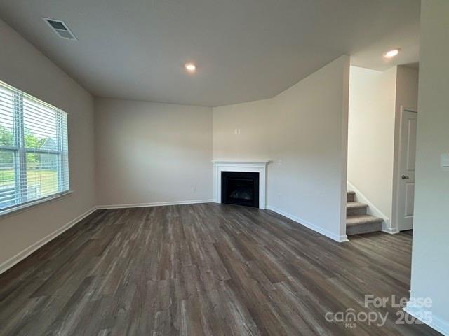 3667 Mercer Street Terrell, NC 28682 - Photo 22 of 38 an empty room with wooden floor and windows