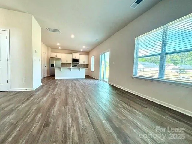 a view of a living room with windows