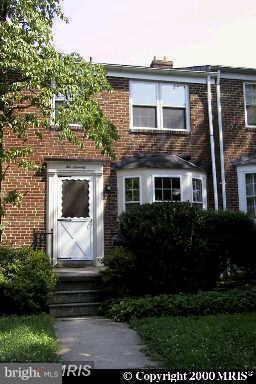 270 Stanmore Road Baltimore, MD 21212 - Photo 1 of 1 a front view of a house with a garden