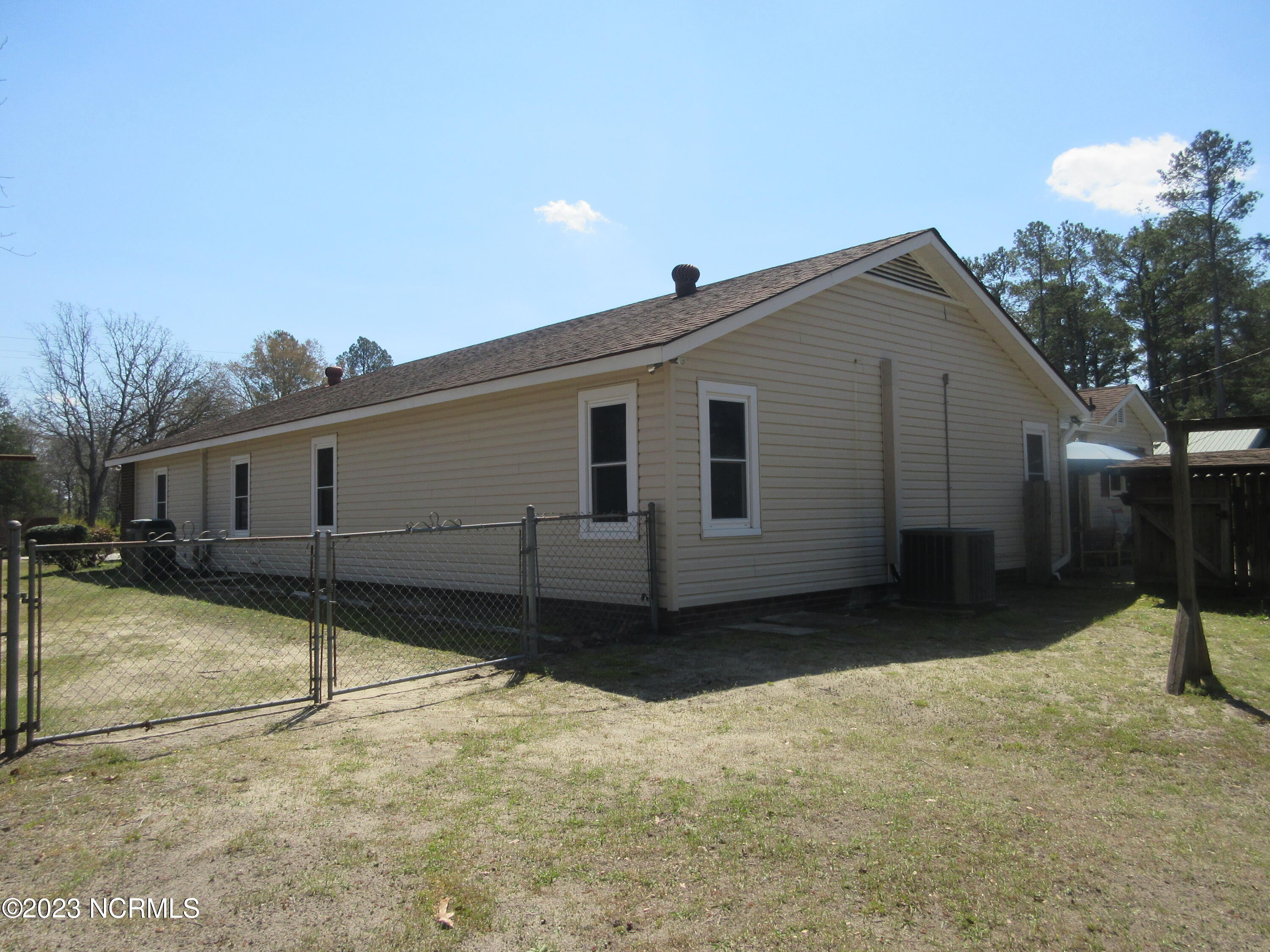 12940 Blue Woods Road Laurinburg, NC 28352 - Photo 12 of 14 side view of the house