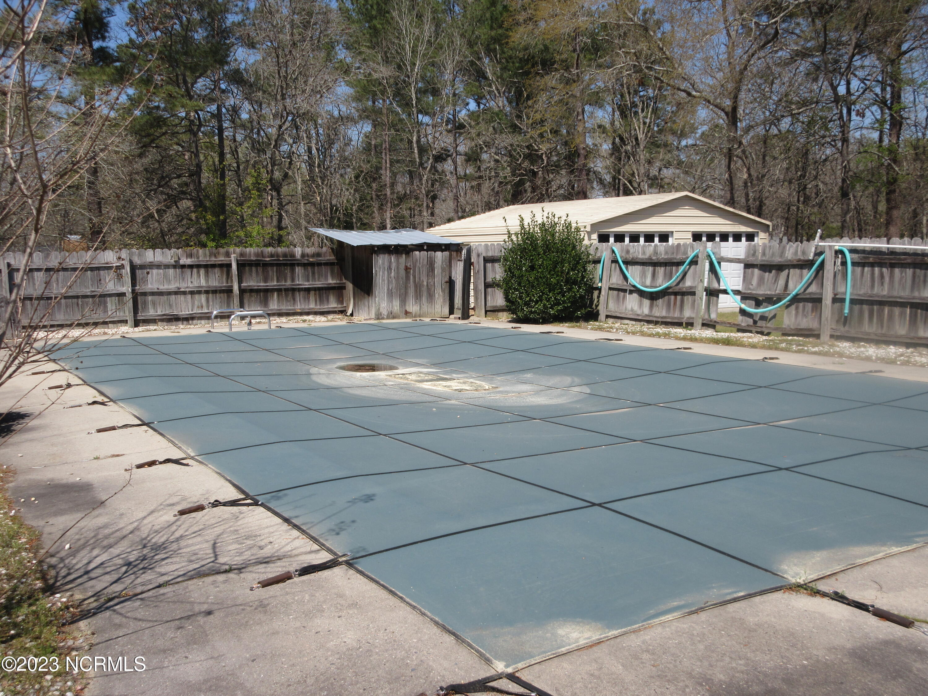 12940 Blue Woods Road Laurinburg, NC 28352 - Photo 9 of 14 in ground pool (still covered)