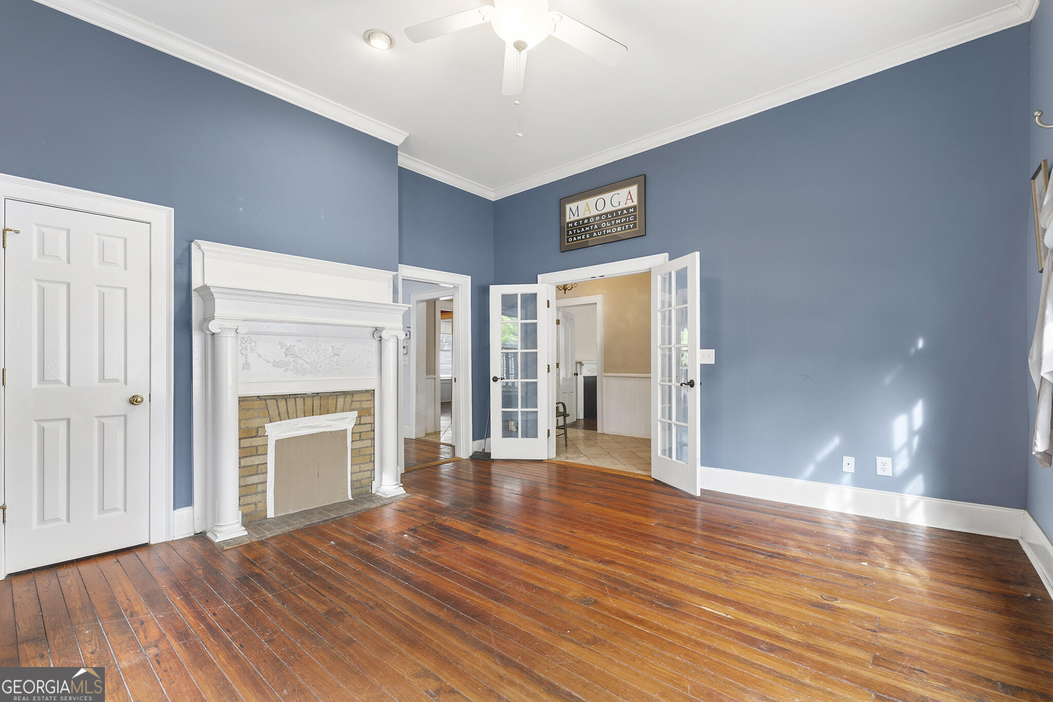 1469 Chestnut Street Macon, GA 31201 - Photo 8 of 26 a view of a livingroom with wooden floor