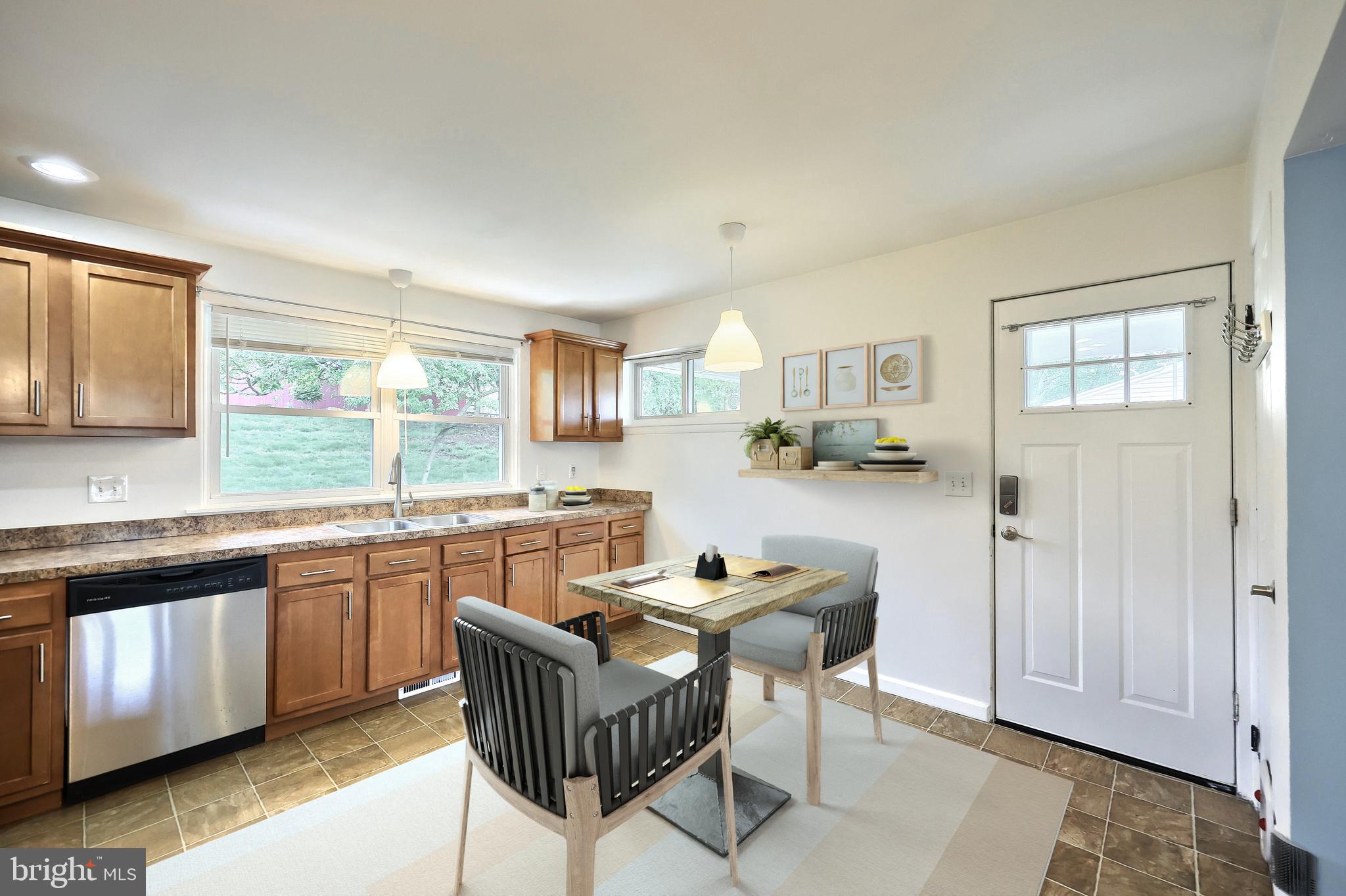 2550 Log Cabin Road York, PA 17408 - Photo 7 of 51 a kitchen with granite countertop a sink cabinets and window