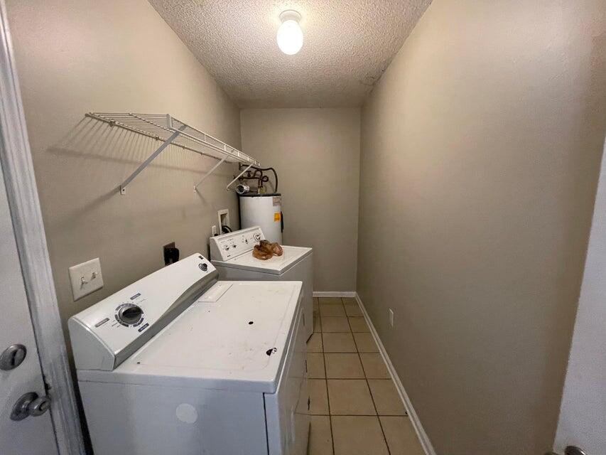 487 Woodlawn Road Freeport, FL 32439 - Photo 14 of 15 a utility room with dryer and washer