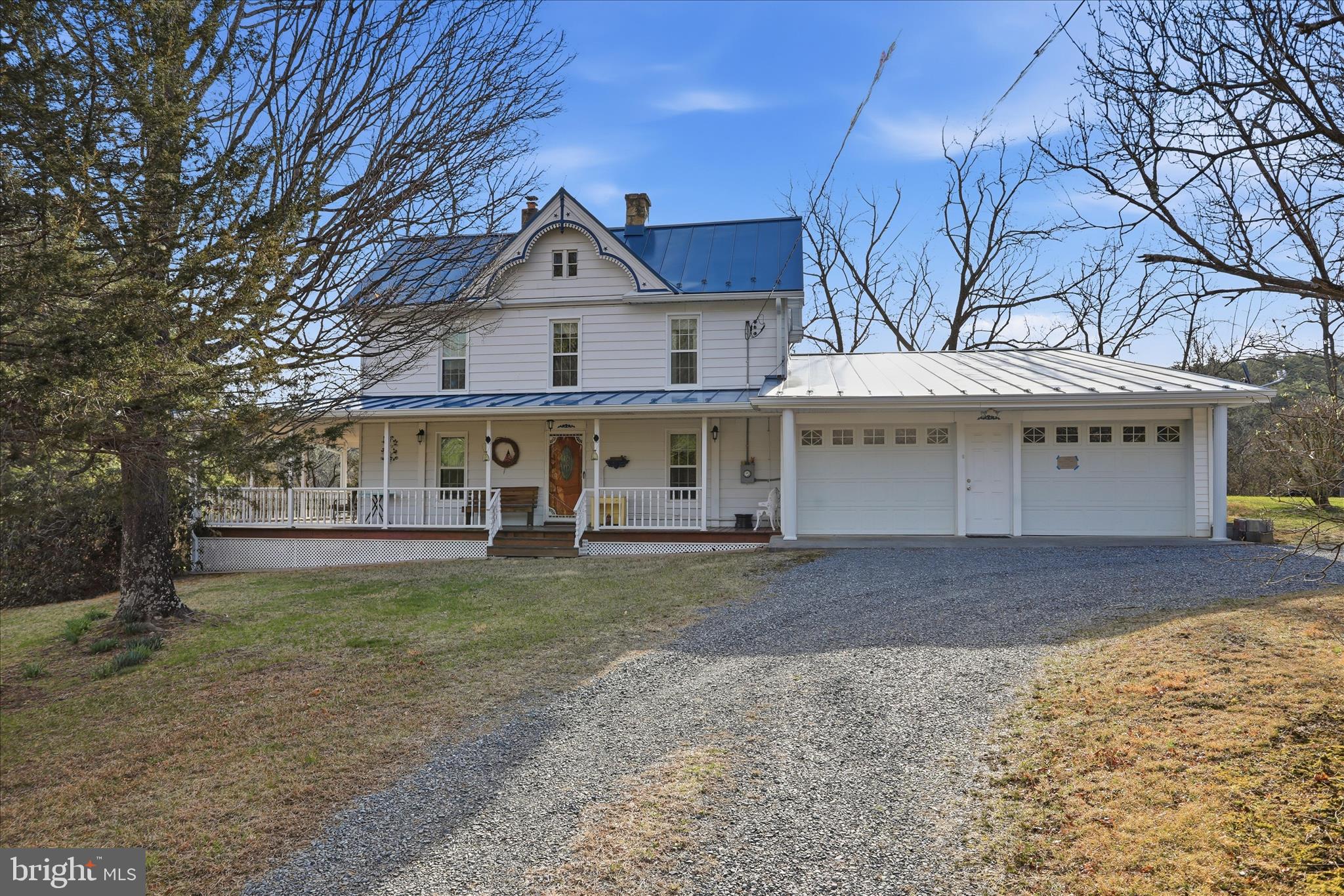 175 Clark Road Wardensville, WV 26851 - Photo 1 of 59 a front view of a house with a yard