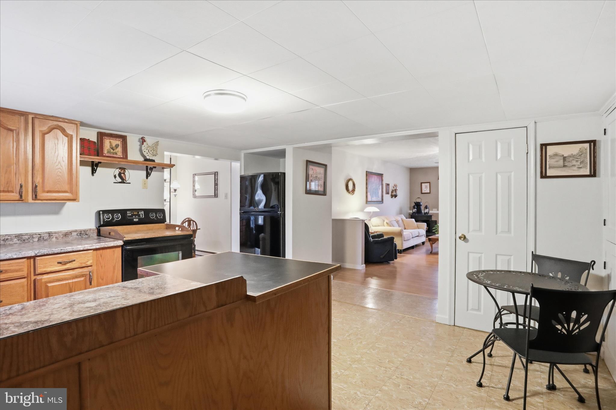175 Clark Road Wardensville, WV 26851 - Photo 13 of 59 a living room with furniture and a wooden floor