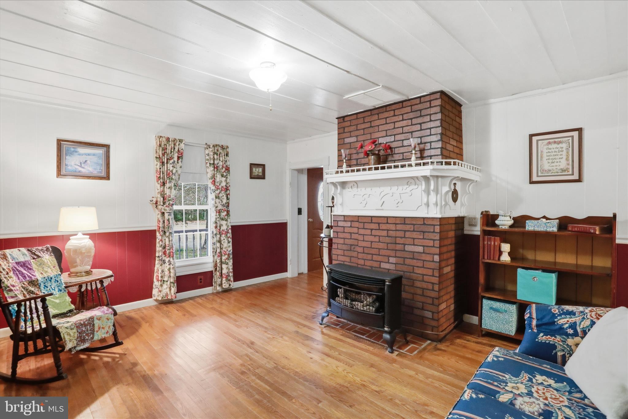 175 Clark Road Wardensville, WV 26851 - Photo 14 of 59 a living room with furniture and a fireplace