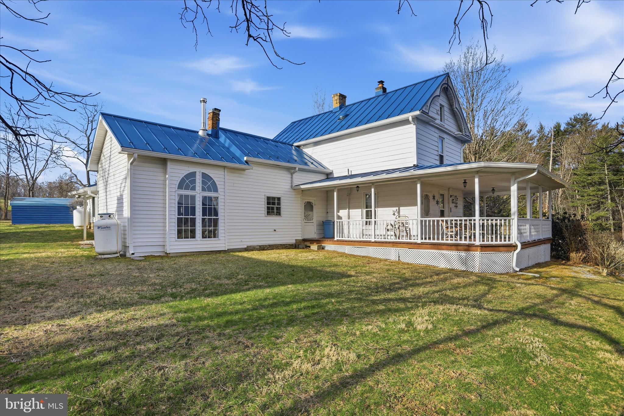 175 Clark Road Wardensville, WV 26851 - Photo 40 of 59 a view of a house with a yard