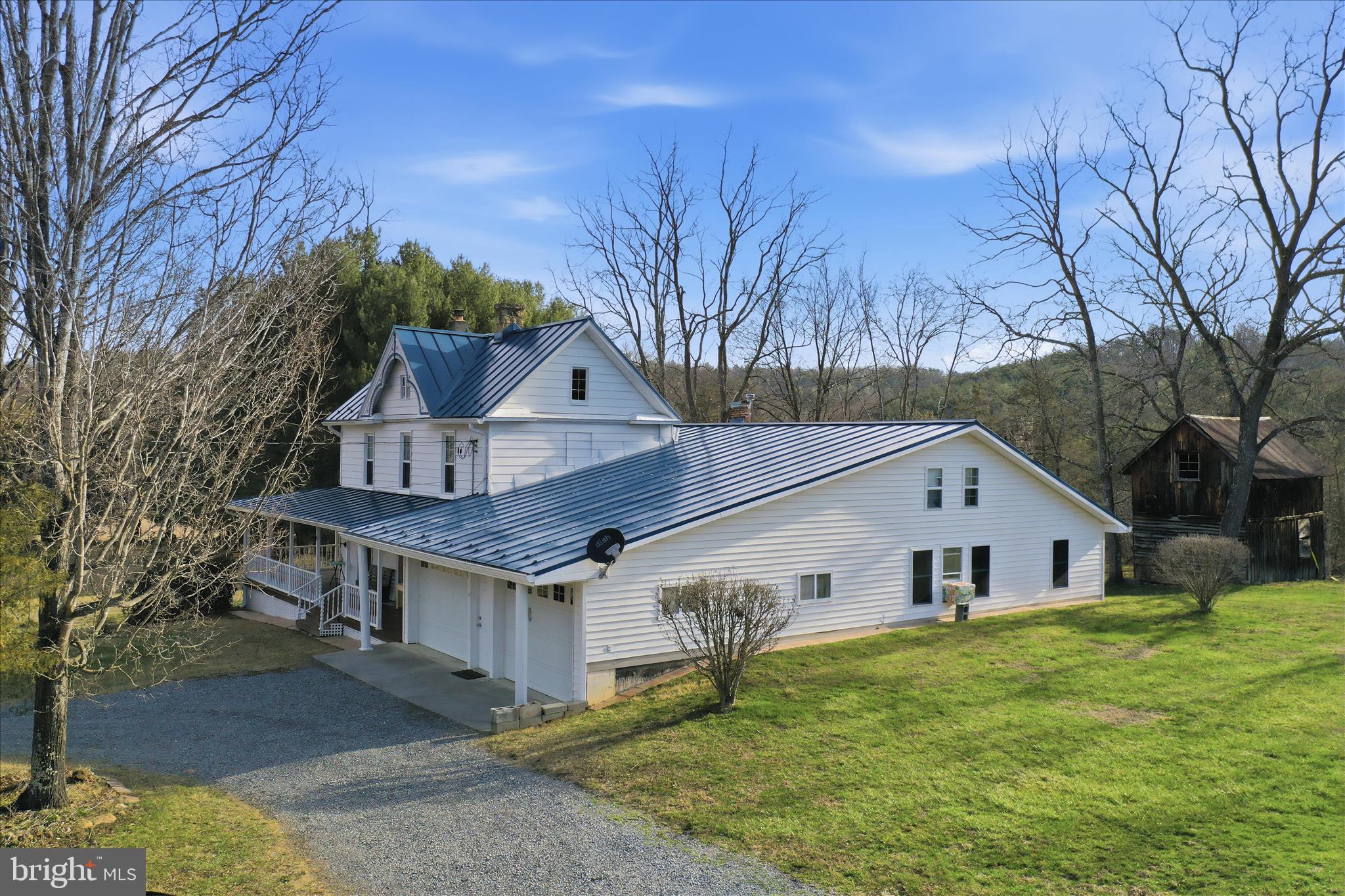 175 Clark Road Wardensville, WV 26851 - Photo 4 of 59 a view of a house with a yard