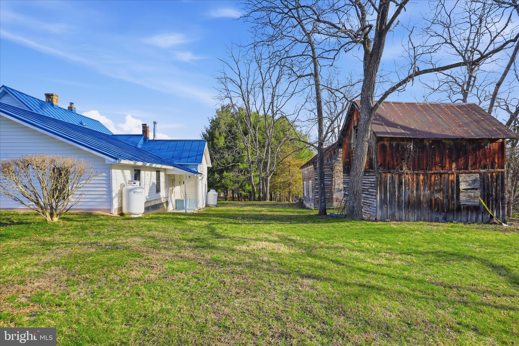 175 Clark Road Wardensville, WV 26851 - Photo 43 of 59 a view of a house with a yard