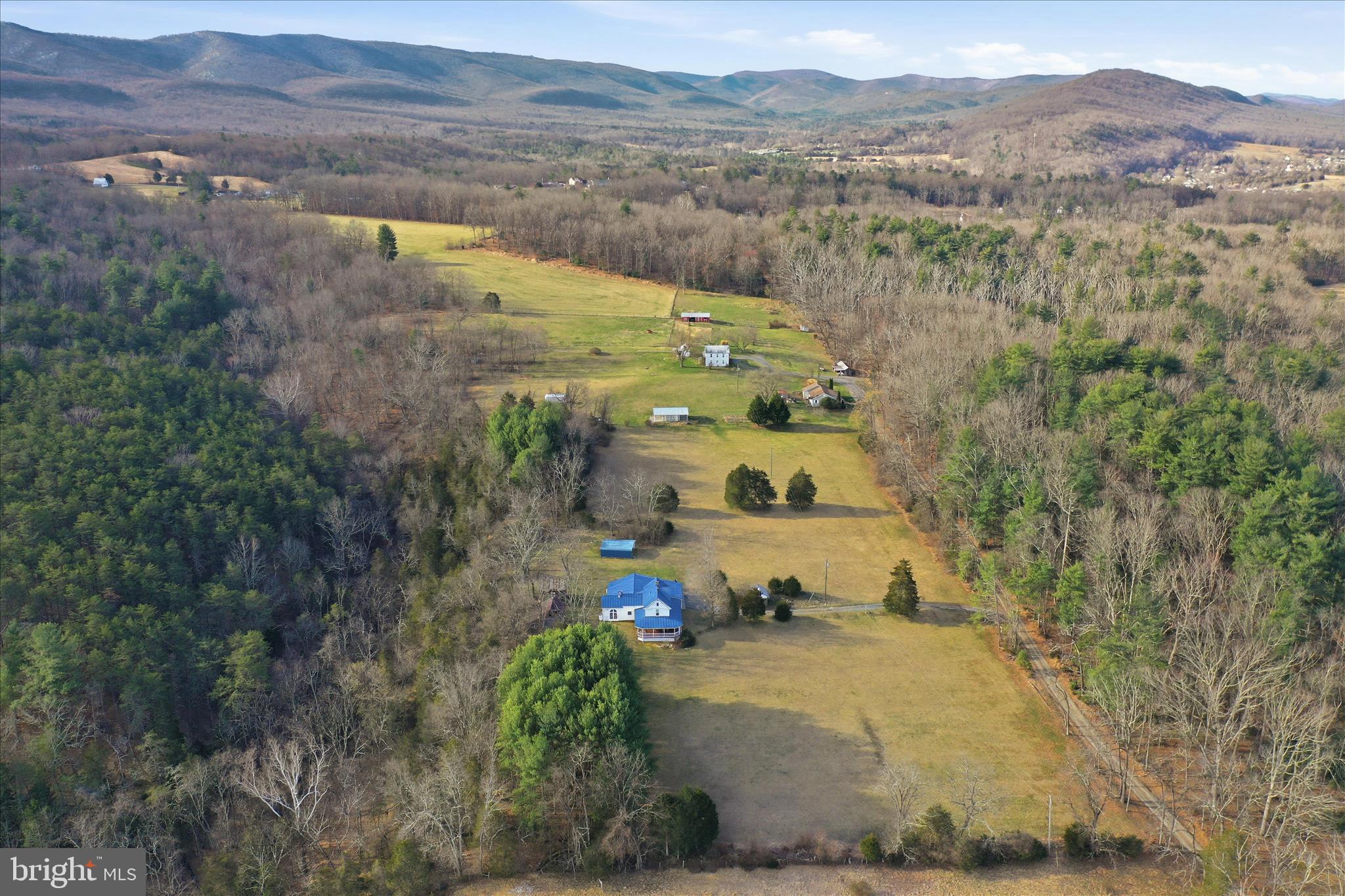 175 Clark Road Wardensville, WV 26851 - Photo 51 of 59 a view of a lake with a mountain in the back