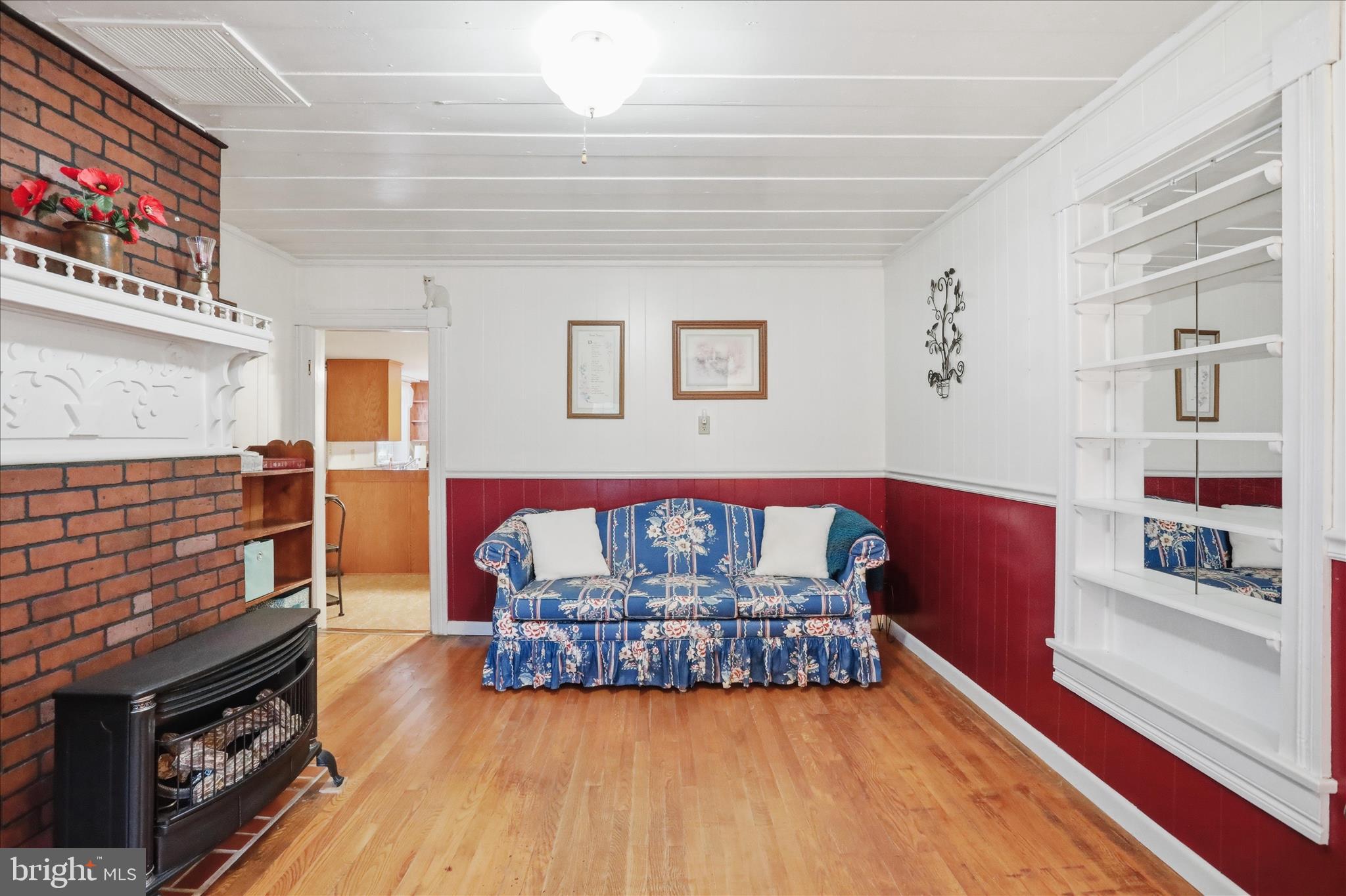 175 Clark Road Wardensville, WV 26851 - Photo 8 of 59 a living room with furniture and a fireplace