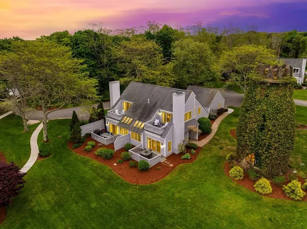 an aerial view of a house with a garden