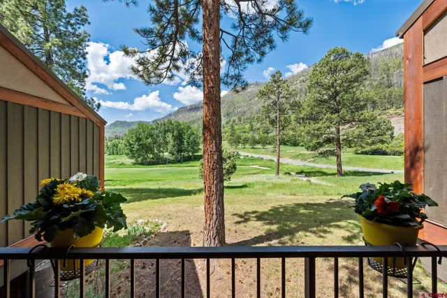 a view of entryway and hall with a window