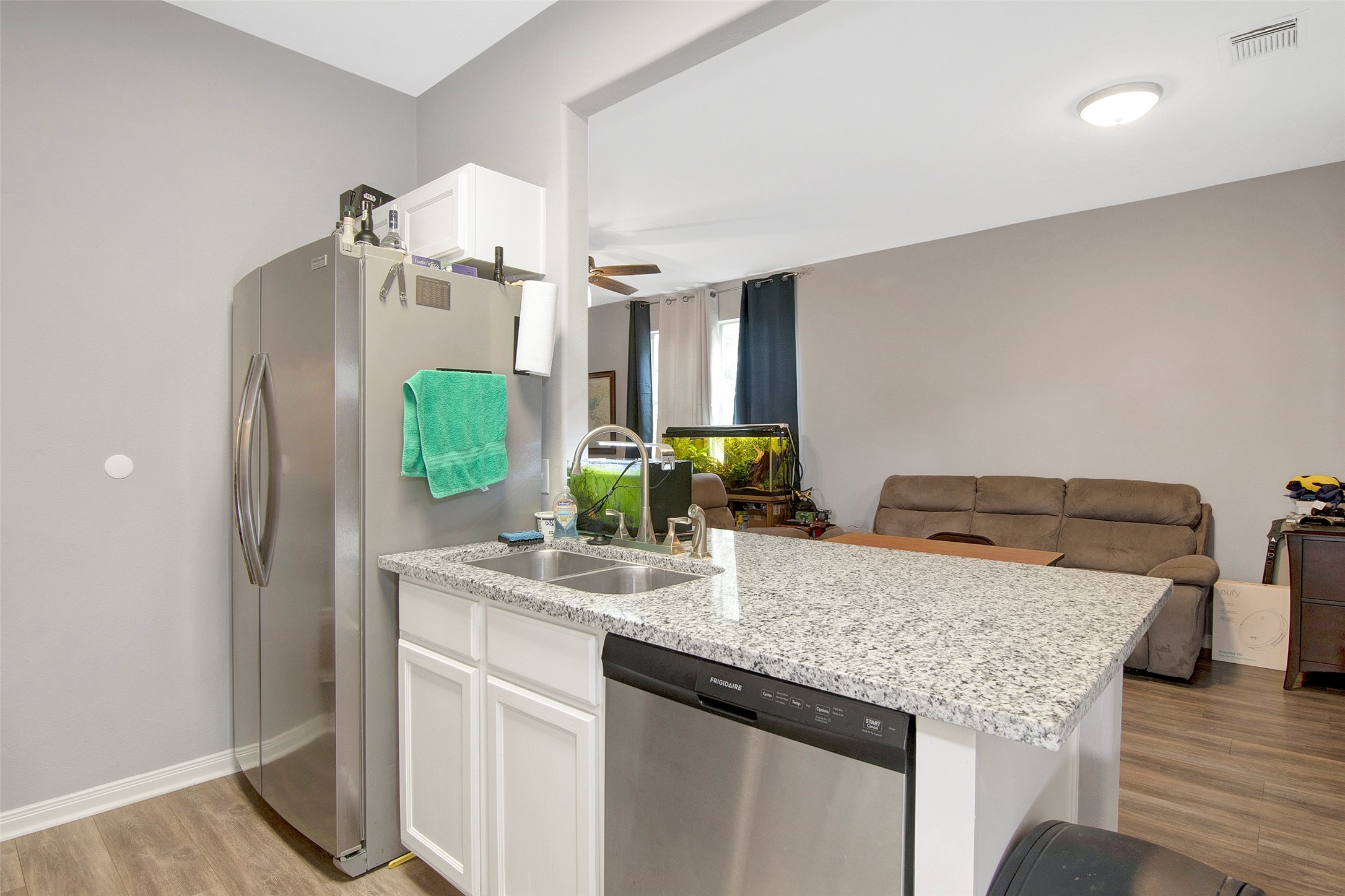 8906 Freeland Street Houston, TX 77075 - Photo 1 of 21 Kitchen is open to the living area and ideal for enjoying guests.