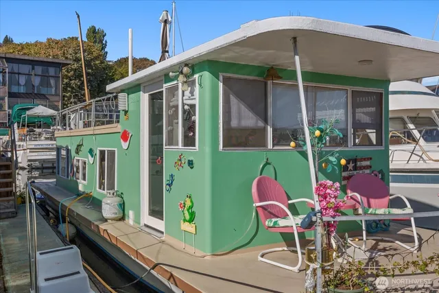 a bedroom with furniture and a lamp