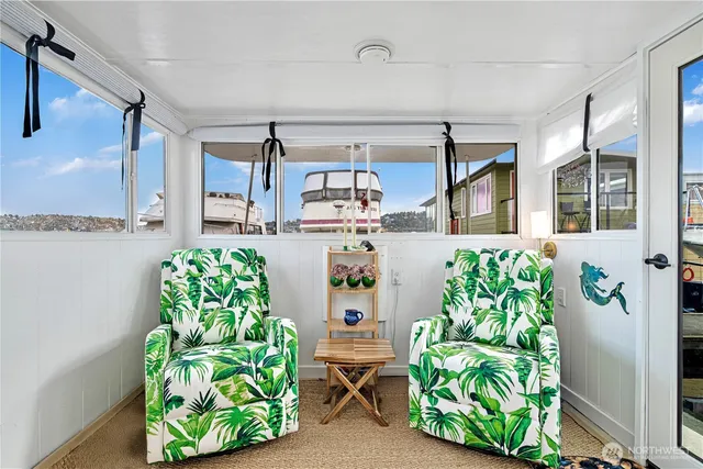 a bathroom with a tub a sink and a shower curtain