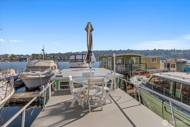 a view of a chairs and table in patio