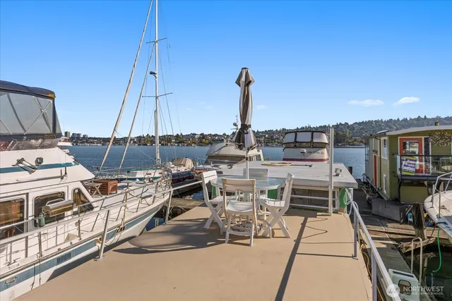 a bathroom with a toilet a sink and shower