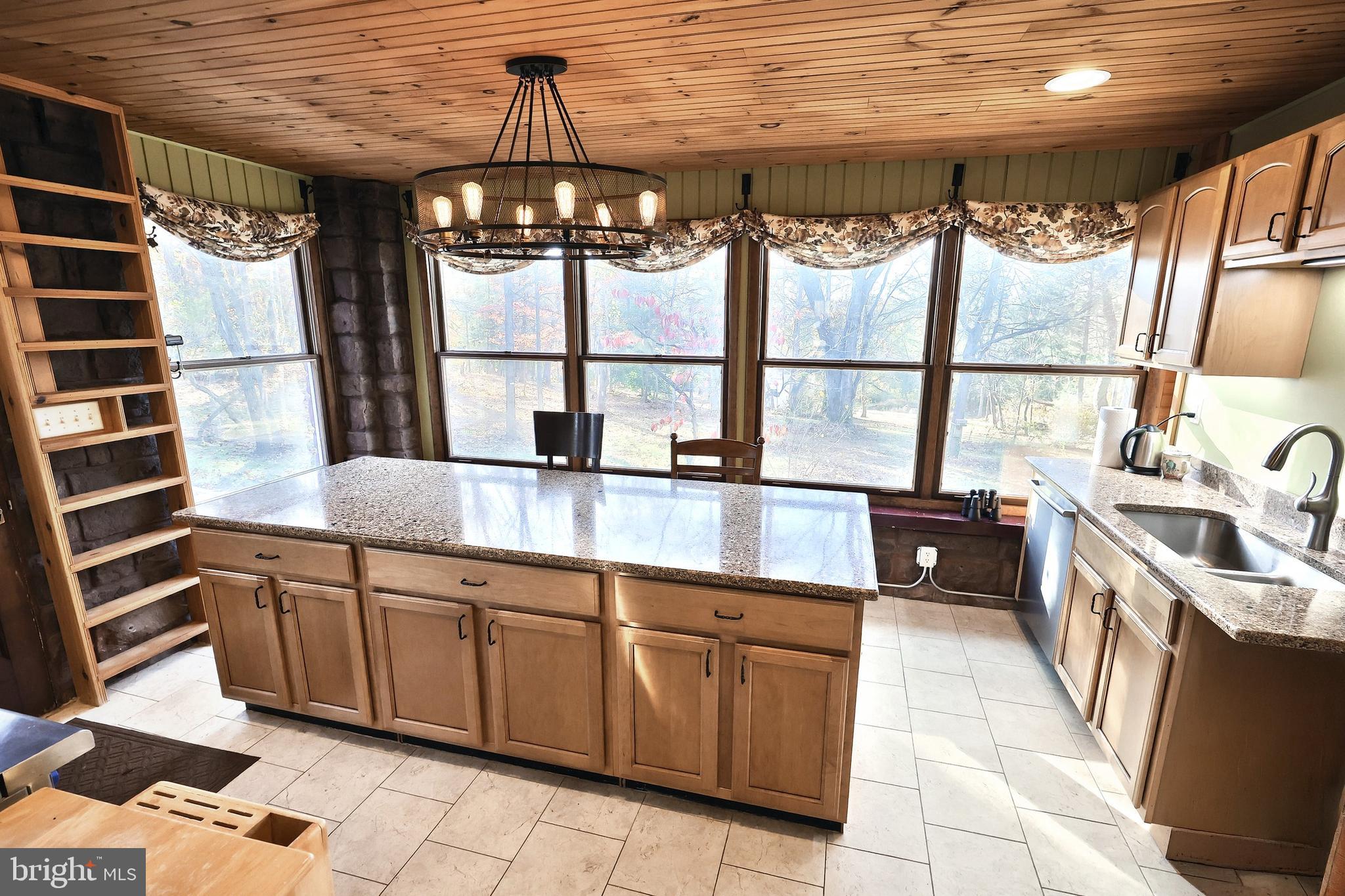 6691 Harmony Grove Road Dover, PA 17315 - Photo 14 of 66 a kitchen with a sink and a stove
